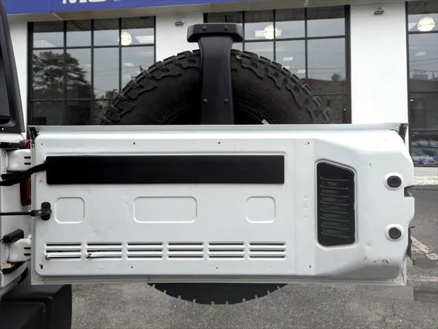 Photo of 2015 Bright White Clearcoat Jeep Wrangler Unlimited