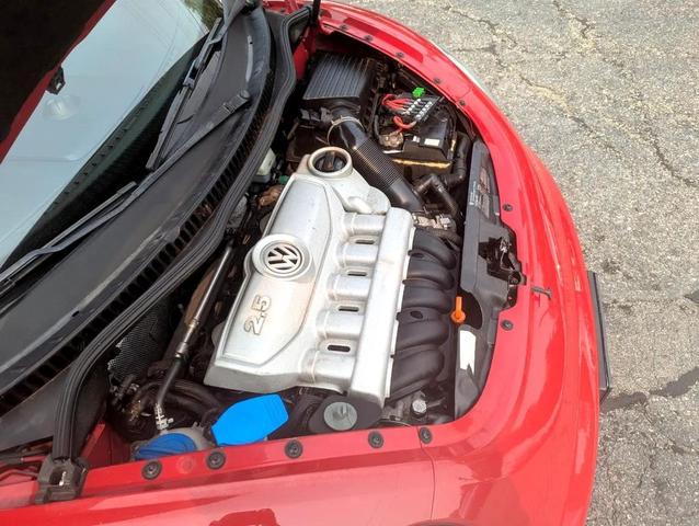 Photo of 2008 Red Volkswagen New Beetle