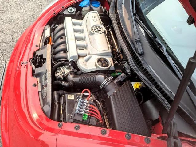 Photo of 2008 Red Volkswagen New Beetle