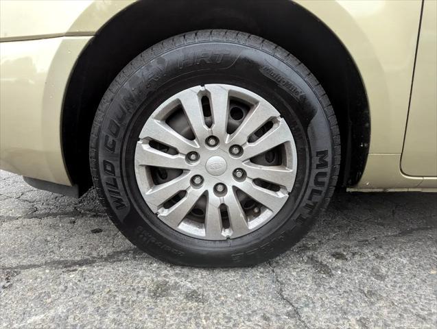 Photo of 2011 Gold Kia Sedona