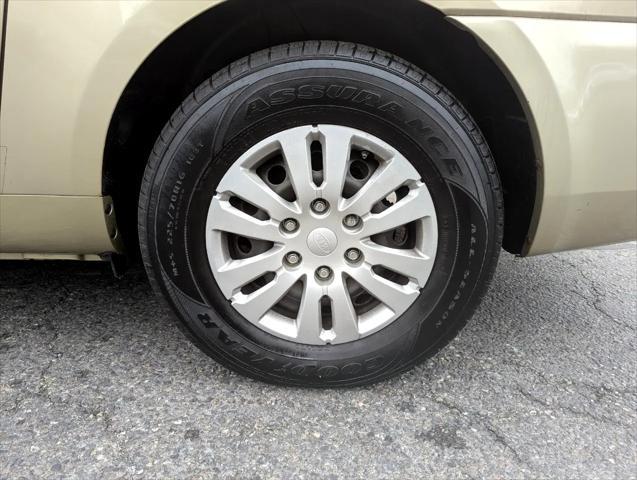 Photo of 2011 Gold Kia Sedona