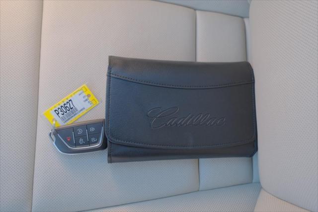 Photo of 2021 Crystal White Tricoat Cadillac CT4