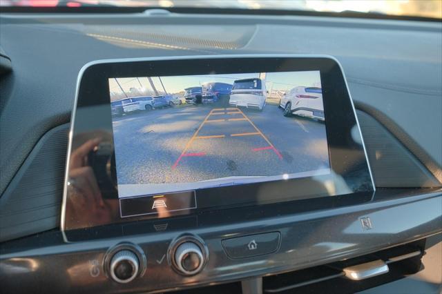 Photo of 2021 Crystal White Tricoat Cadillac CT4