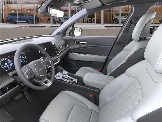 Photo of 2025 Jungle Green Kia Sportage
