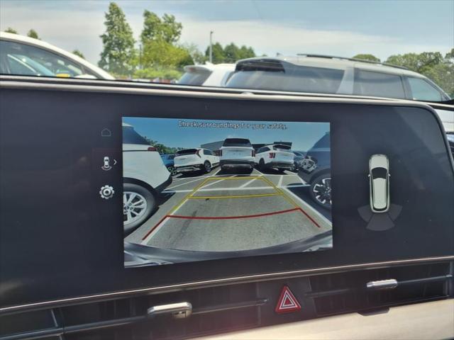 Photo of 2023 Gravity Gray Kia Sportage Hybrid