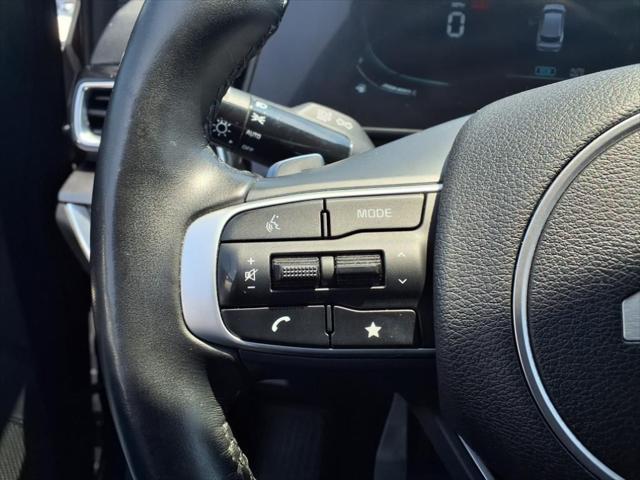 Photo of 2023 Gravity Gray Kia Sportage Hybrid