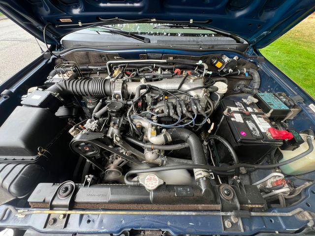 Photo of 2004 Blue Mitsubishi Montero Sport