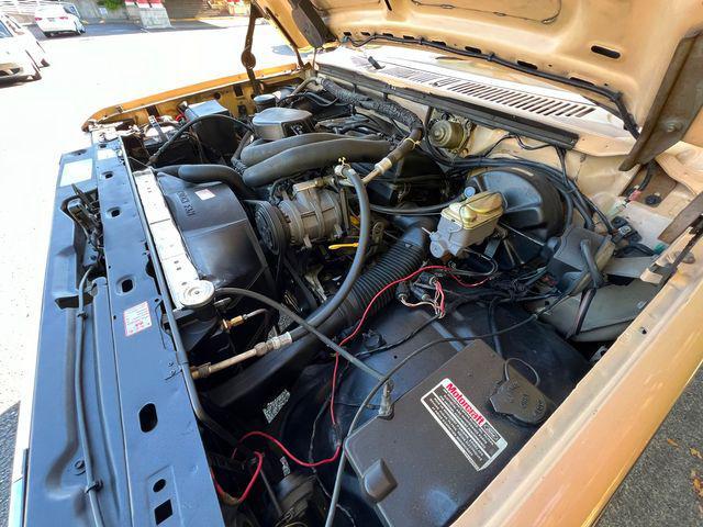 Photo of 1985 Brown Ford Pickup Truck