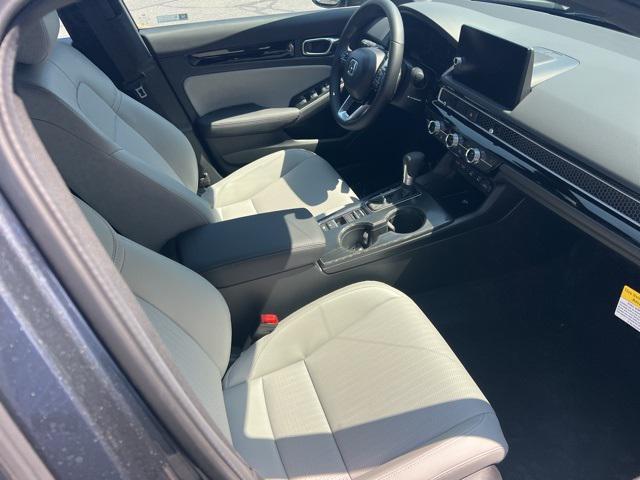 Photo of 2026 Gold Honda Civic Hybrid