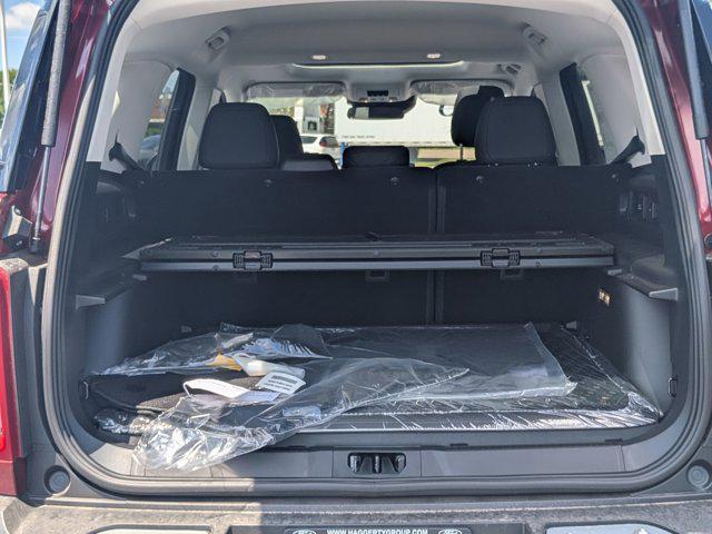 Photo of 2025 Ruby Red Metallic Tinted Clearcoat Ford Bronco Sport