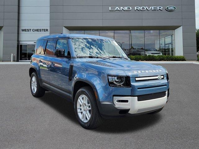 Photo of 2025 Tasman Blue Metallic Land Rover Defender