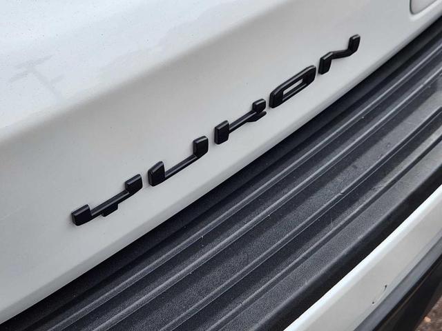 Photo of 2023 White Frost Tri-Coat GMC Yukon XL