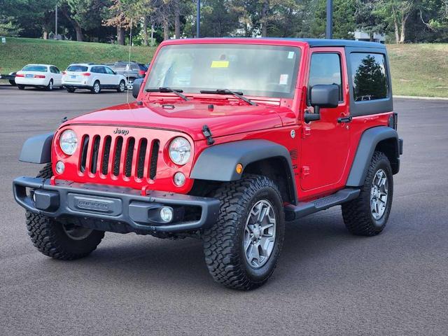 Photo of 2014 Flame Red Clearcoat Jeep Wrangler