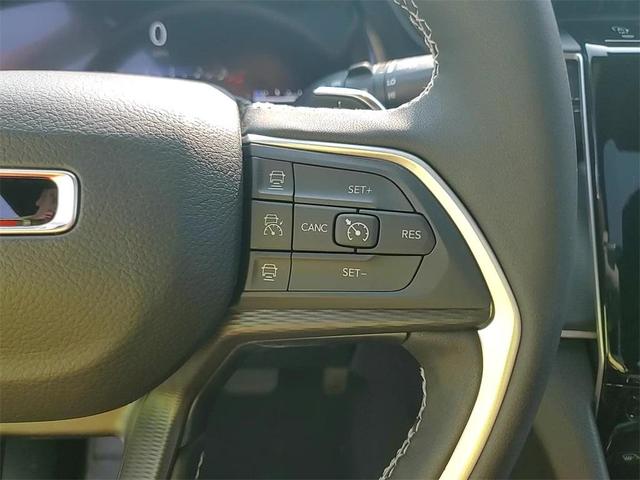 Photo of 2025 Diamond Black Crystal Pearlcoat Jeep Grand Cherokee