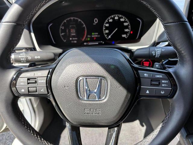 Photo of 2025 Platinum White Pearl Honda Civic