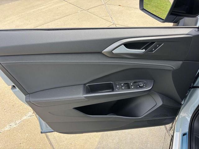 Photo of 2025 Monument Gray w/Deep Black Roof Volkswagen Taos