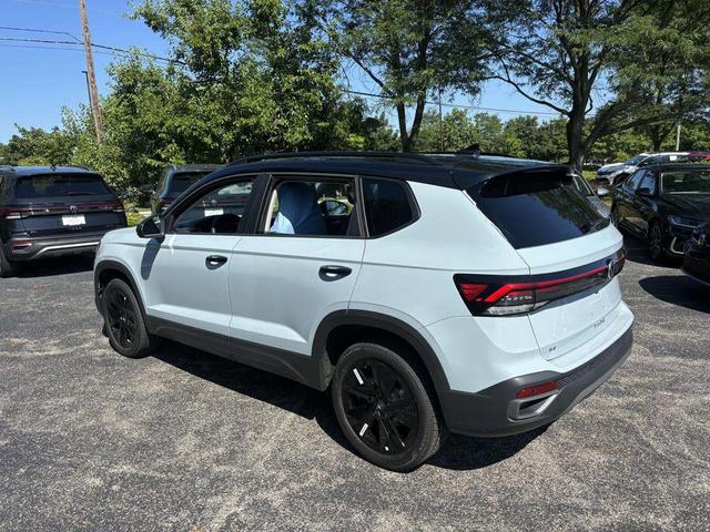Photo of 2025 Monument Gray w/Deep Black Roof Volkswagen Taos