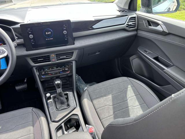 Photo of 2025 Monument Gray w/Deep Black Roof Volkswagen Taos