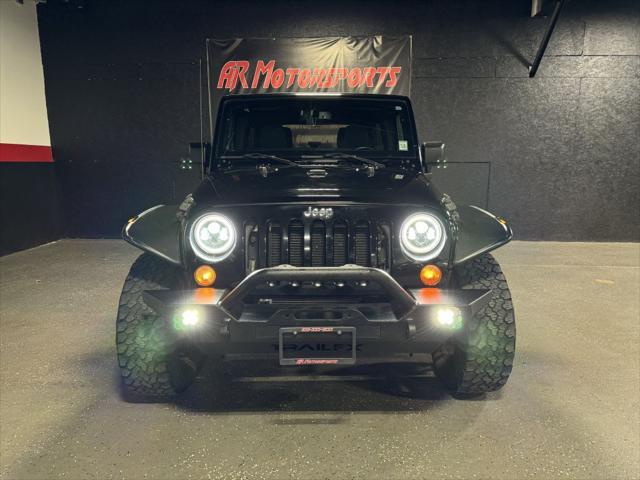 Photo of 2015 Black Clearcoat Jeep Wrangler Unlimited