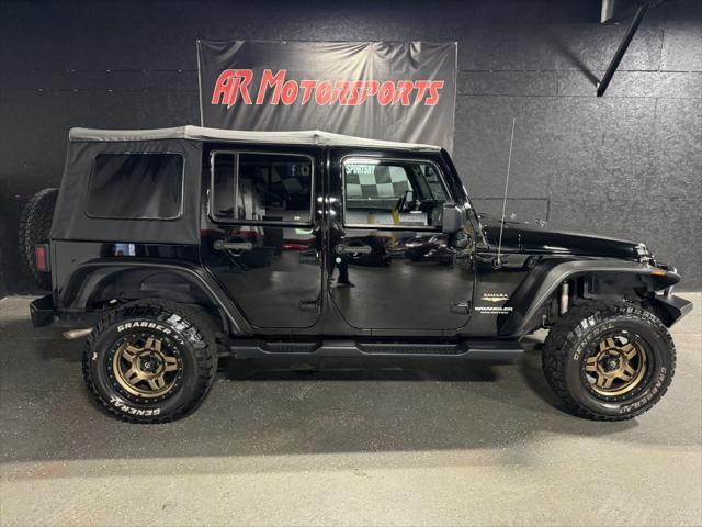 Photo of 2015 Black Clearcoat Jeep Wrangler Unlimited