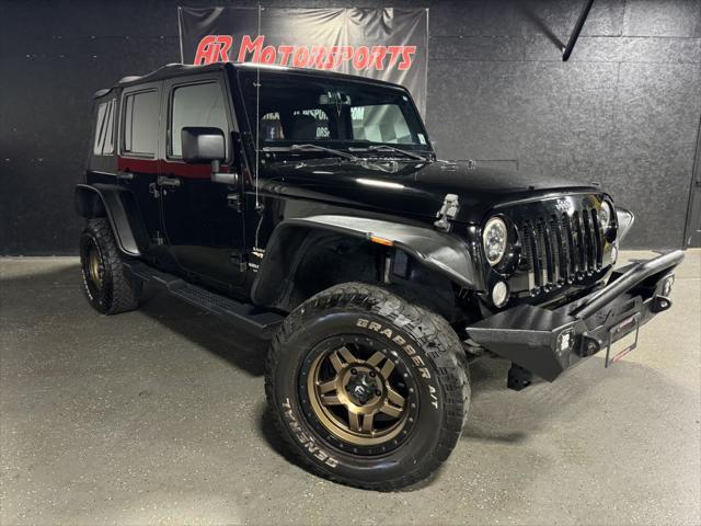 Photo of 2015 Black Clearcoat Jeep Wrangler Unlimited