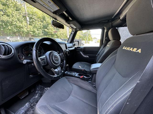 Photo of 2015 Black Clearcoat Jeep Wrangler Unlimited