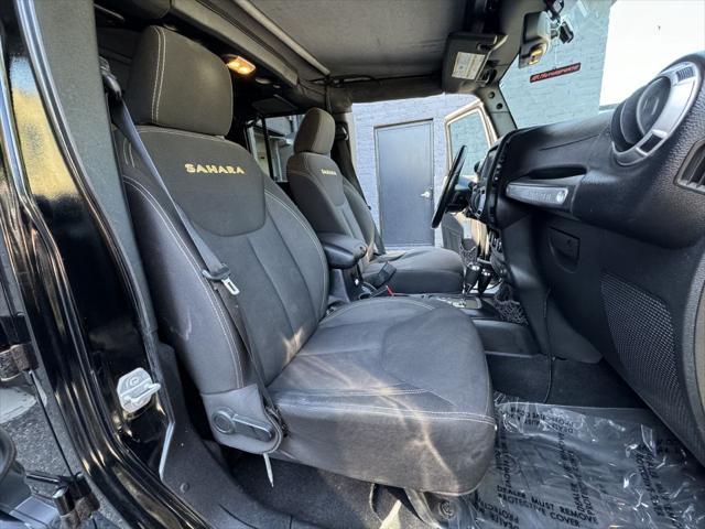 Photo of 2015 Black Clearcoat Jeep Wrangler Unlimited