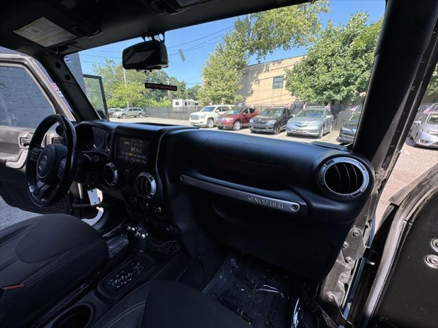 Photo of 2015 Black Clearcoat Jeep Wrangler Unlimited