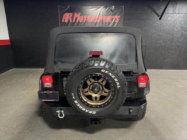 Photo of 2015 Black Clearcoat Jeep Wrangler Unlimited