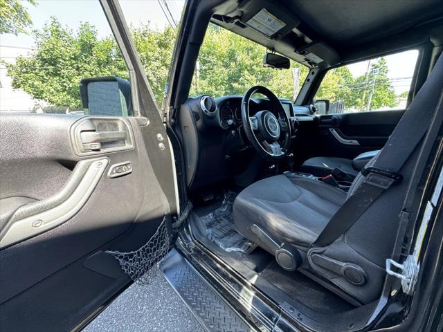 Photo of 2015 Black Clearcoat Jeep Wrangler Unlimited