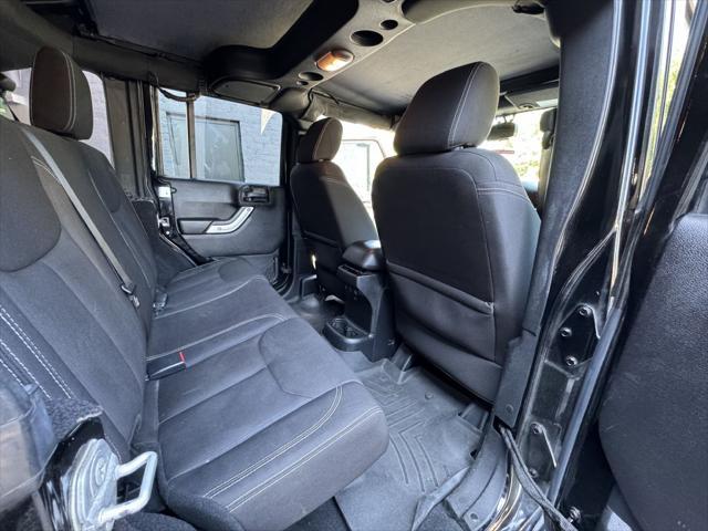 Photo of 2015 Black Clearcoat Jeep Wrangler Unlimited