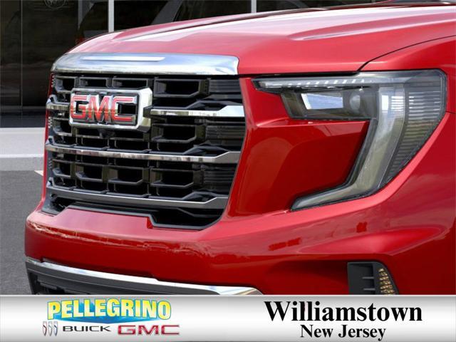 Photo of 2025 Volcanic Red Tintcoat GMC Acadia