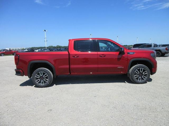 Photo of 2026 Volcanic Red GMC Sierra 1500