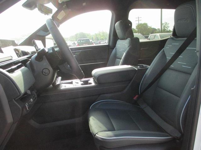 Photo of 2026 Summit White GMC Sierra EV