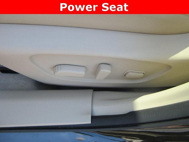 Photo of 2015 Midnight Jade Nissan Rogue