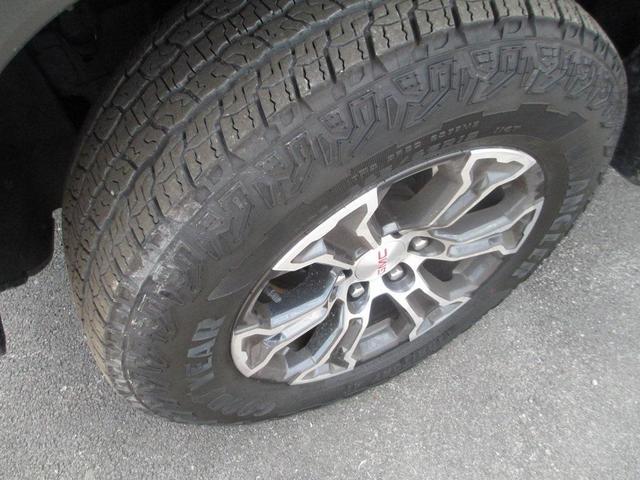 Photo of 2024 Desert Sand Metallic GMC Canyon