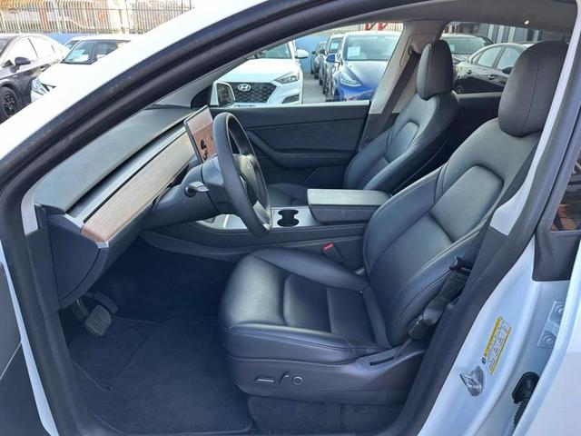 Photo of 2022 Pearl White Multi-Coat Tesla Model Y