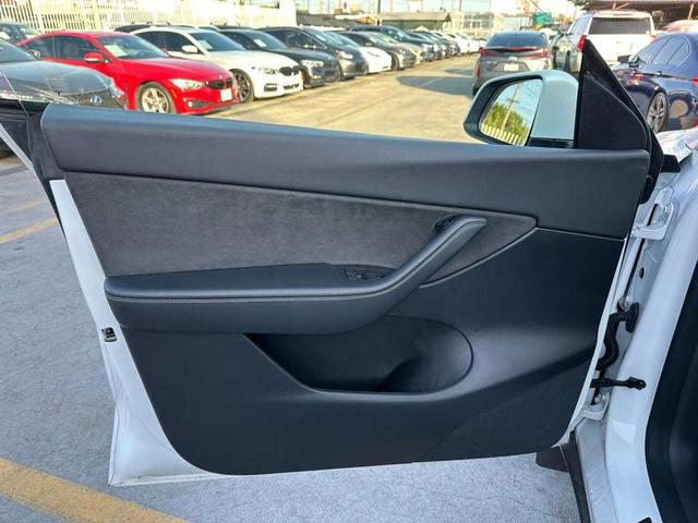 Photo of 2022 Pearl White Multi-Coat Tesla Model Y
