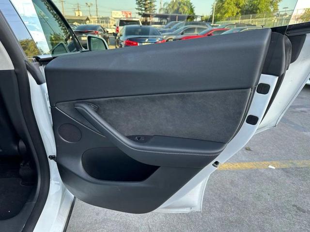 Photo of 2022 Pearl White Multi-Coat Tesla Model Y