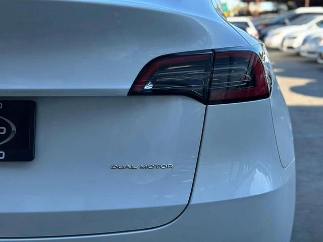 Photo of 2022 Pearl White Multi-Coat Tesla Model Y