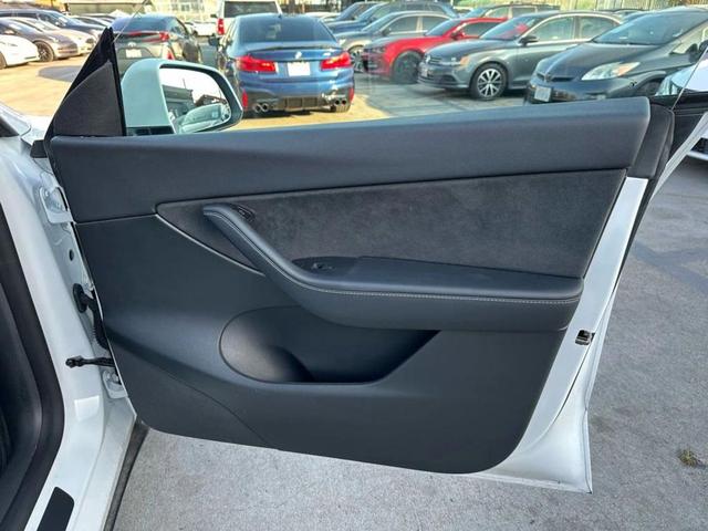 Photo of 2022 Pearl White Multi-Coat Tesla Model Y