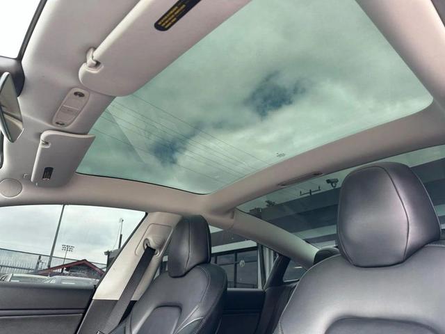 Photo of 2018 Black Tesla Model 3