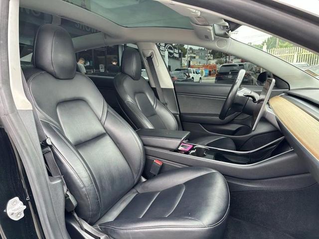 Photo of 2018 Black Tesla Model 3