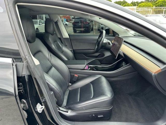 Photo of 2018 Black Tesla Model 3