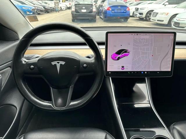 Photo of 2018 Black Tesla Model 3