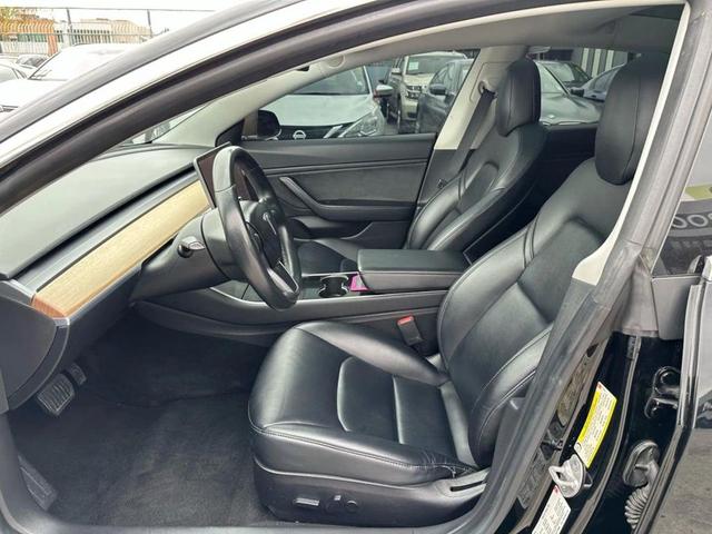 Photo of 2018 Black Tesla Model 3