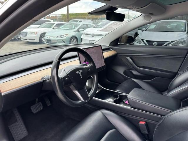 Photo of 2018 Black Tesla Model 3