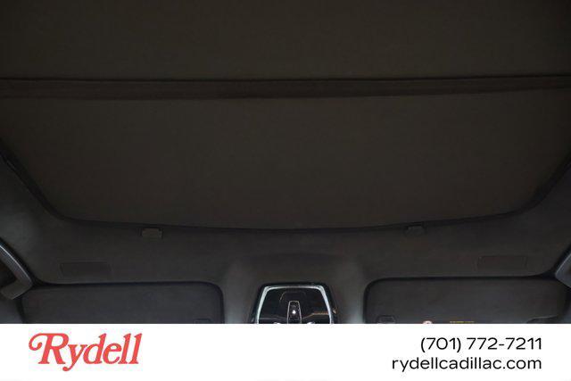Photo of 2025 Black Raven Cadillac Escalade IQ