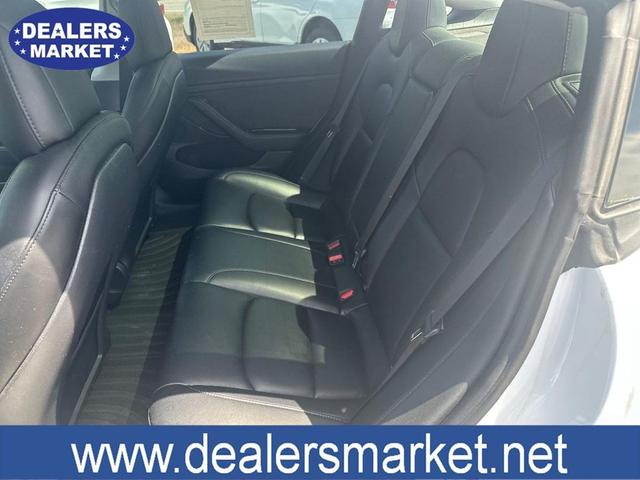 Photo of 2021 Pearl White Multi-Coat Tesla Model 3