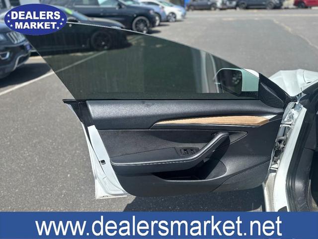 Photo of 2021 Pearl White Multi-Coat Tesla Model 3